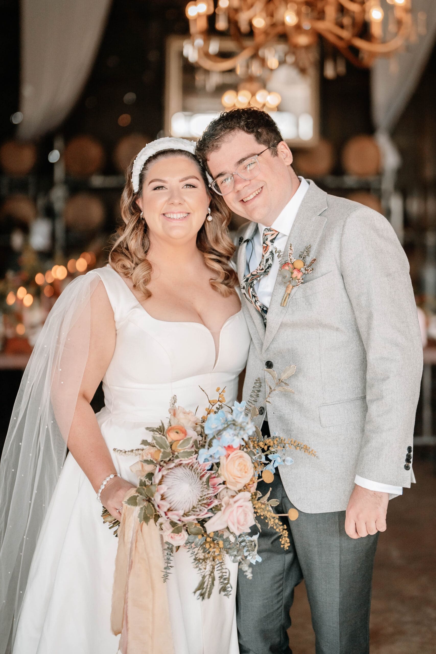 Bride and groom in Olive hill estate barn